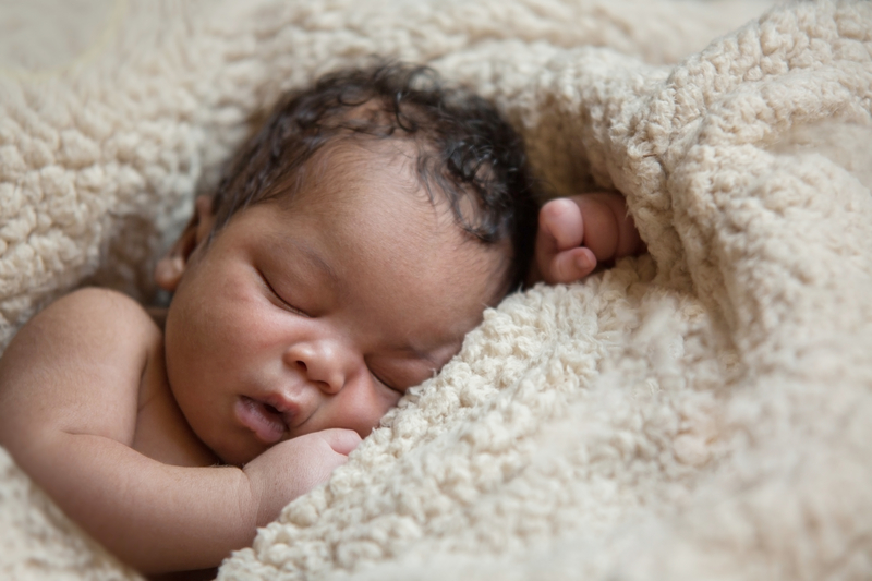 sleeping newborn black baby girl